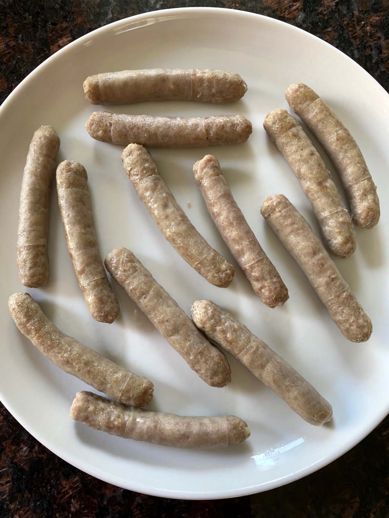 breakfast sausages cooked on a plate