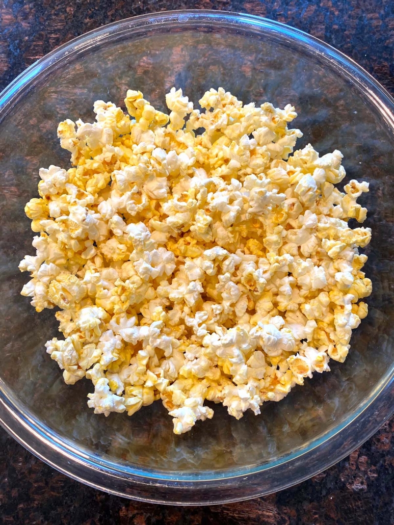 popped popcorn in a glass bowl