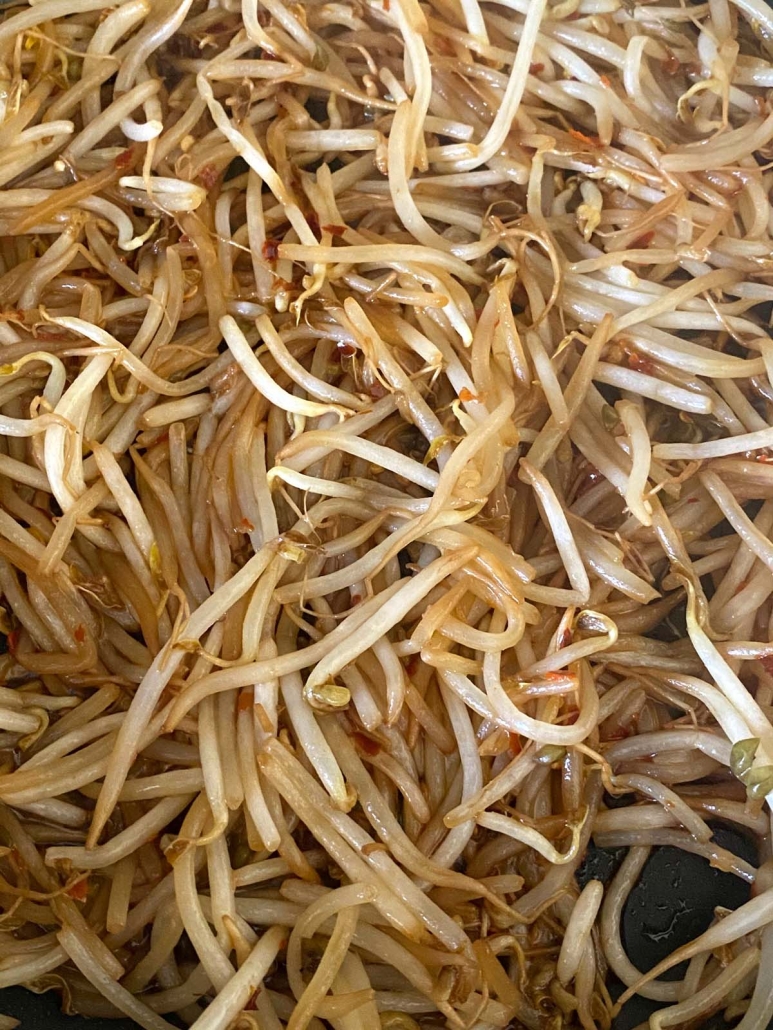 close up of bean sprouts in pan