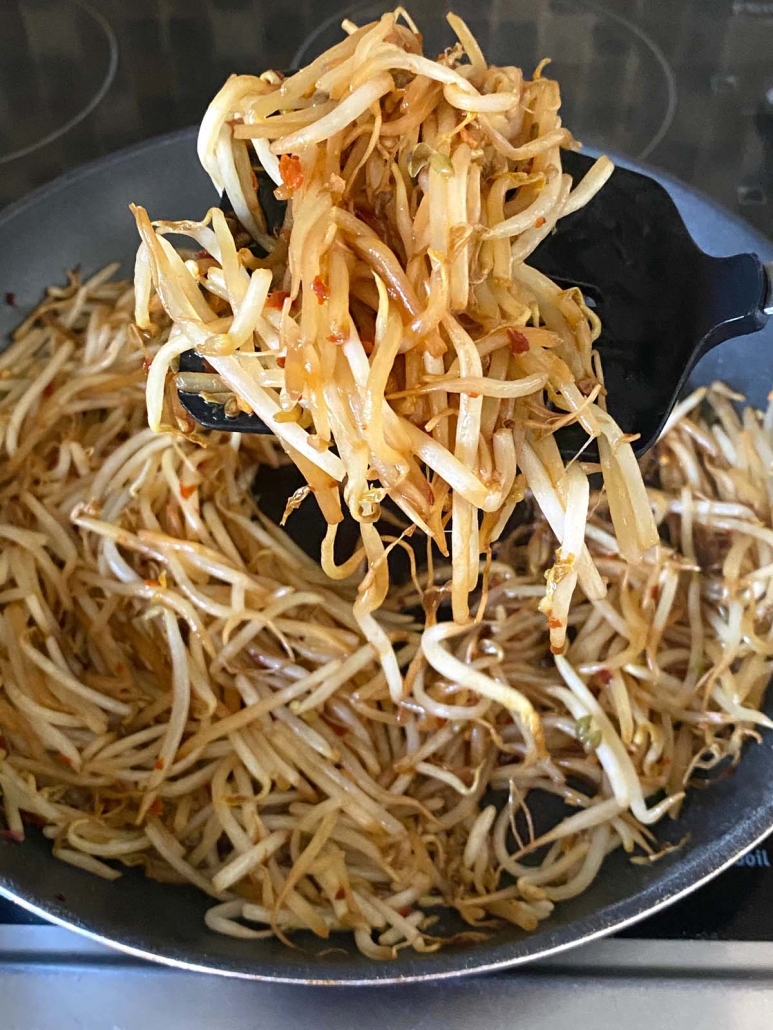 bean sprouts on a frying pan