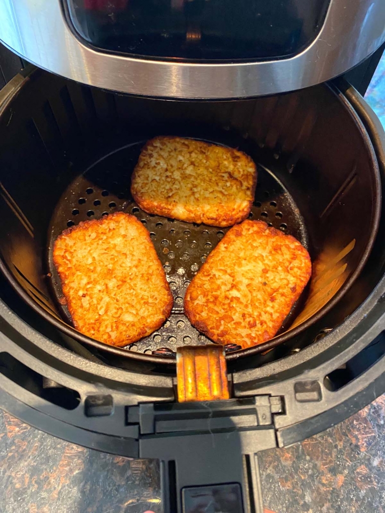 three hash brown patties in air fryer