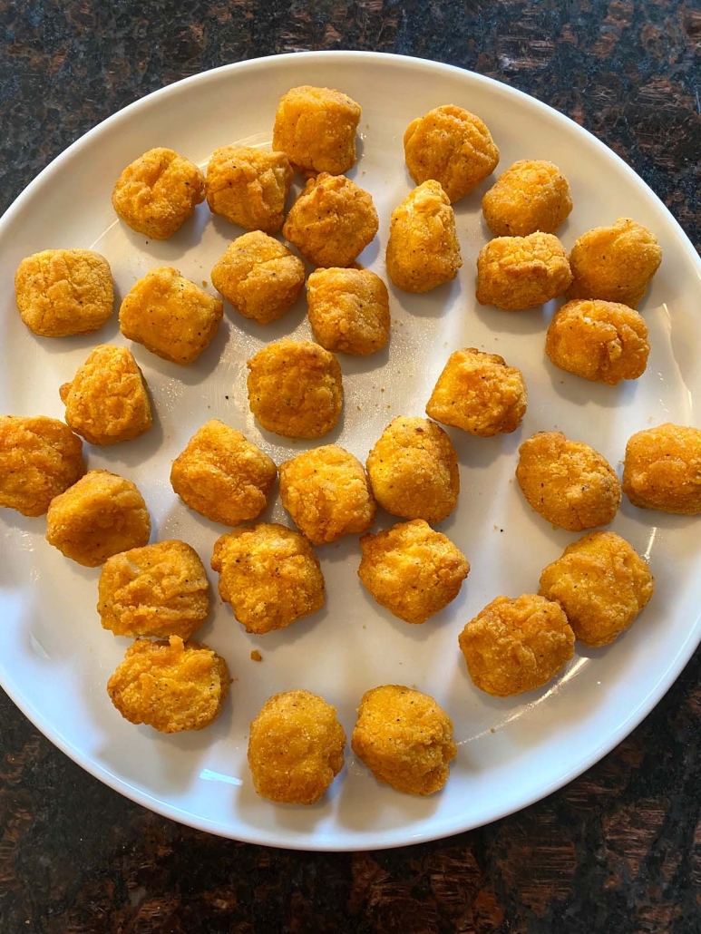 popcorn chicken cooked on white plate