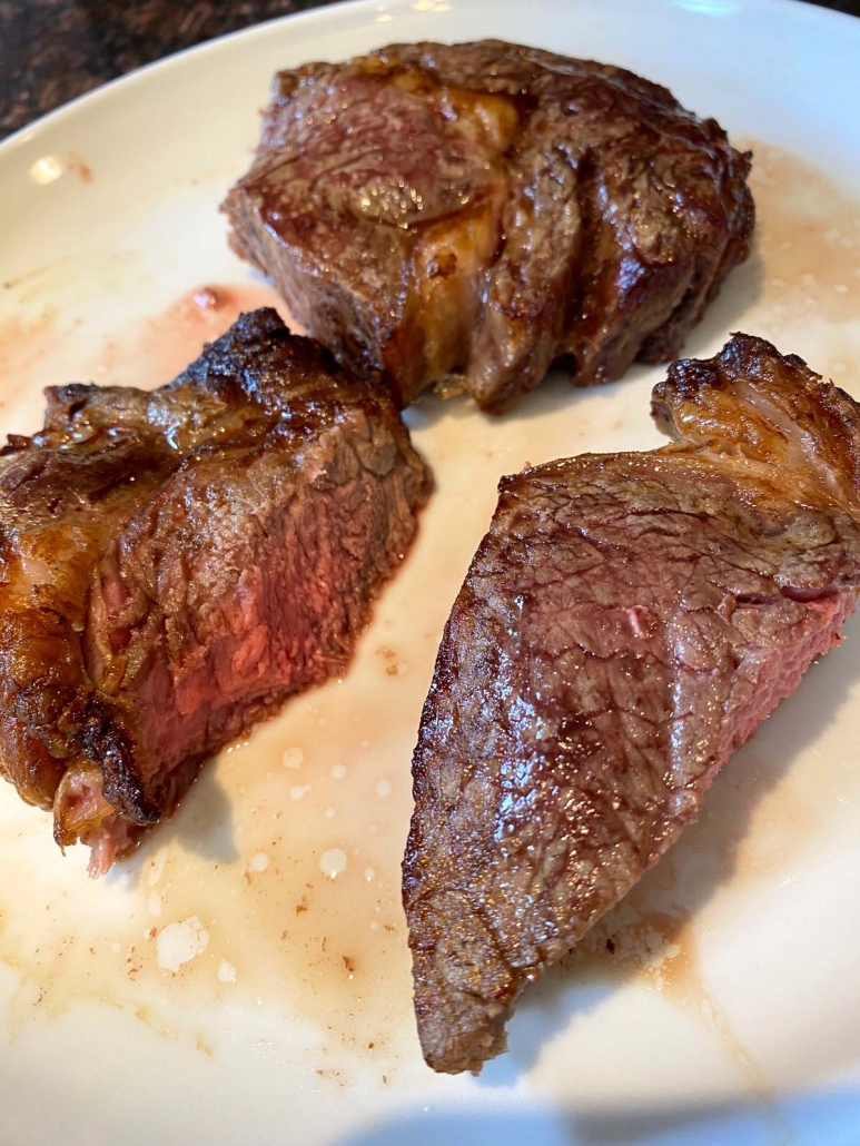cutting a ribeye steak 