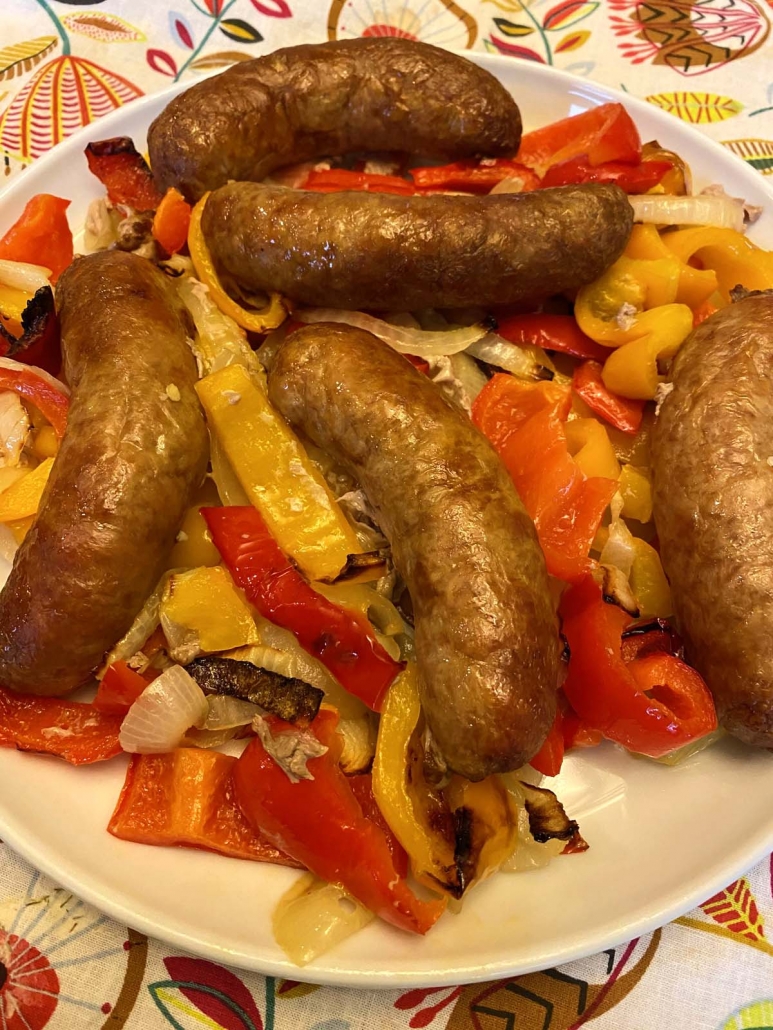 air fried italian sausage and peppers on a white plate 