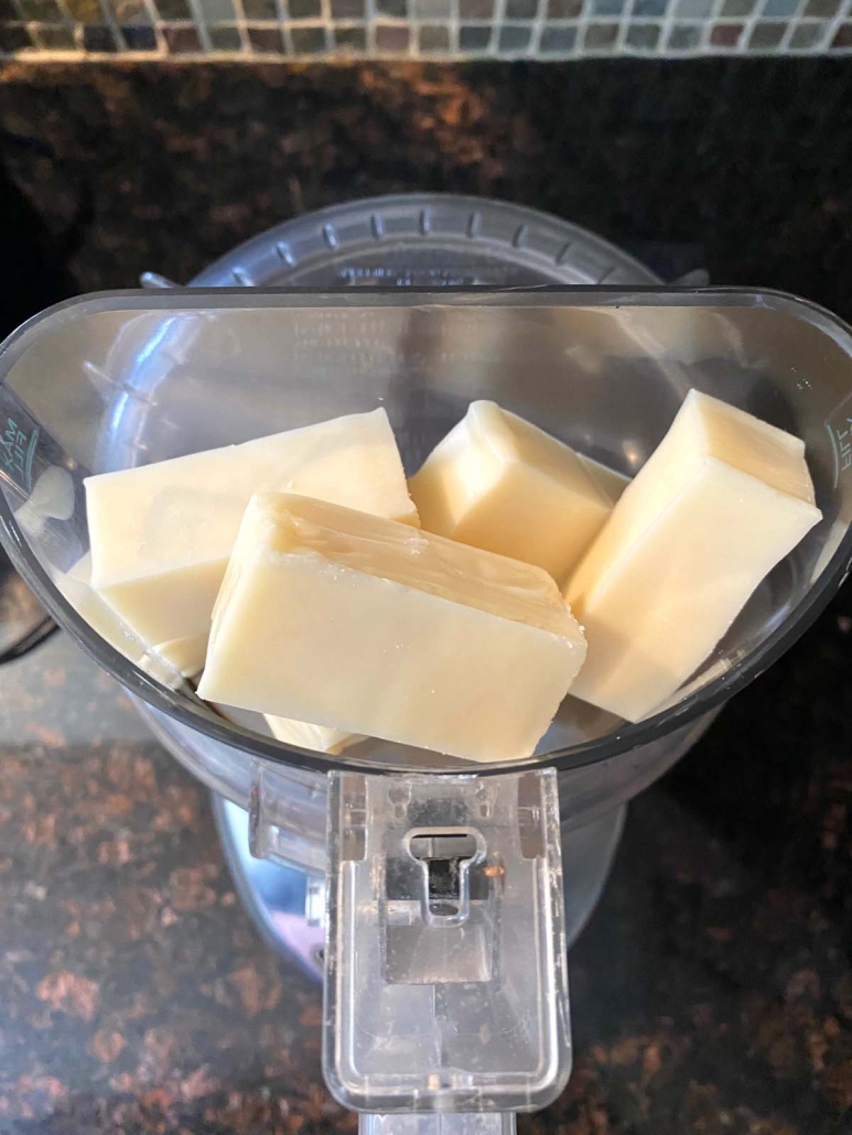 chunks of cheese inserted in food processor