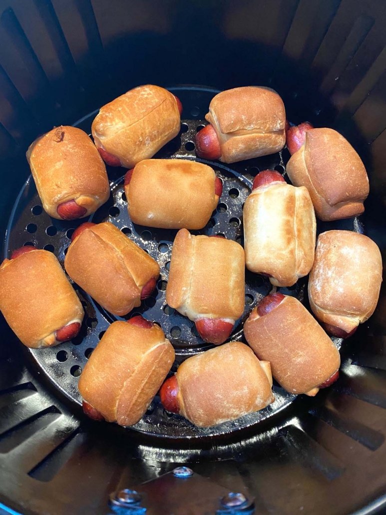 close up of mini bagel dogs in the air fryer