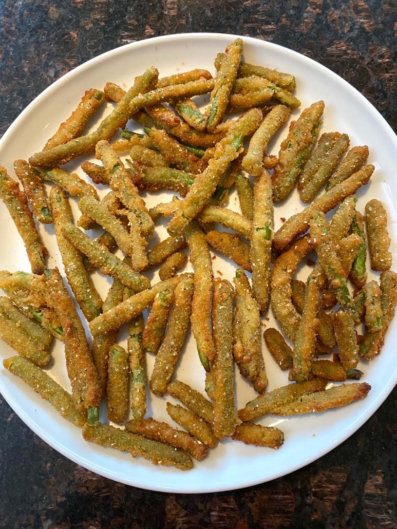 breaded crispy green beans on plate