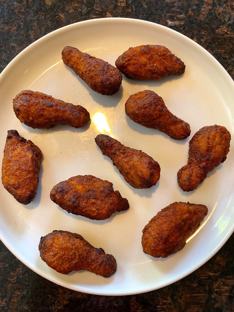 cooked boneless chicken wings on plate