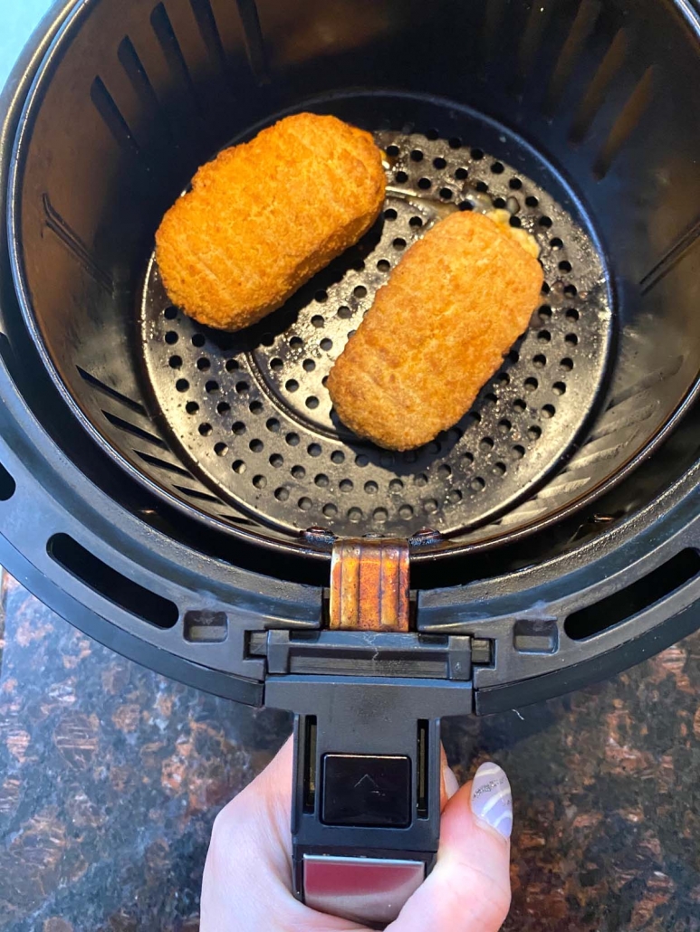 chicken parmesan cooking in the air fryer