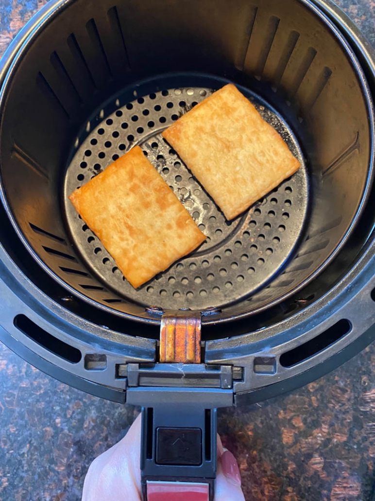 two strudels in the air fryer basket