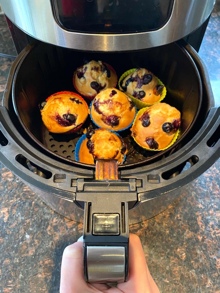 blueberry muffins cooking in the air fryer
