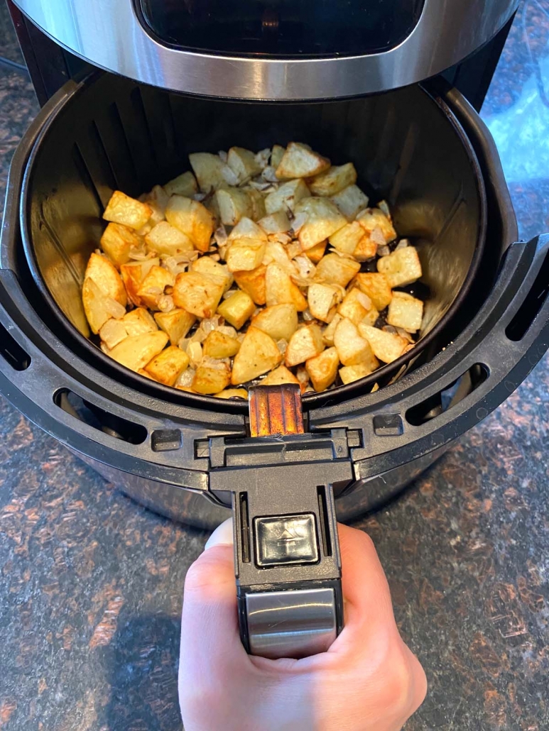 chopped potatoes and onions in the air fryer