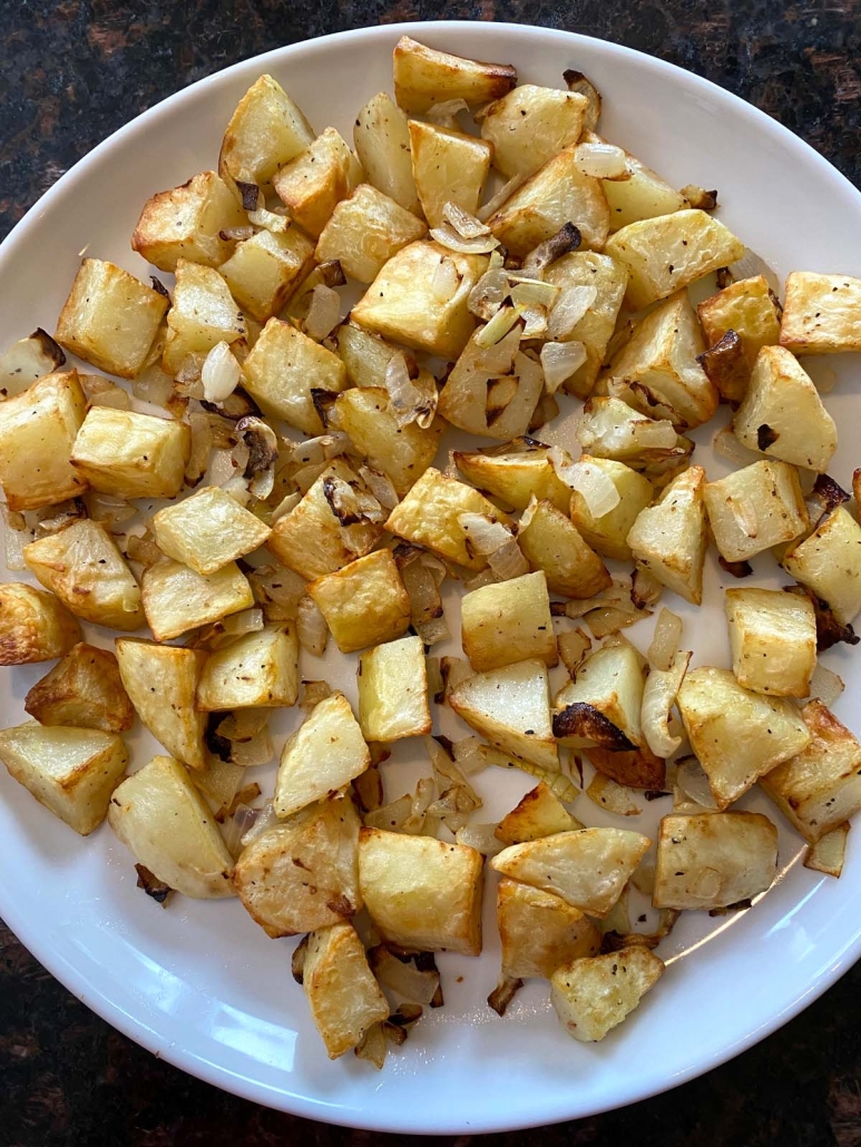 air fried onions and potatoes on a plate