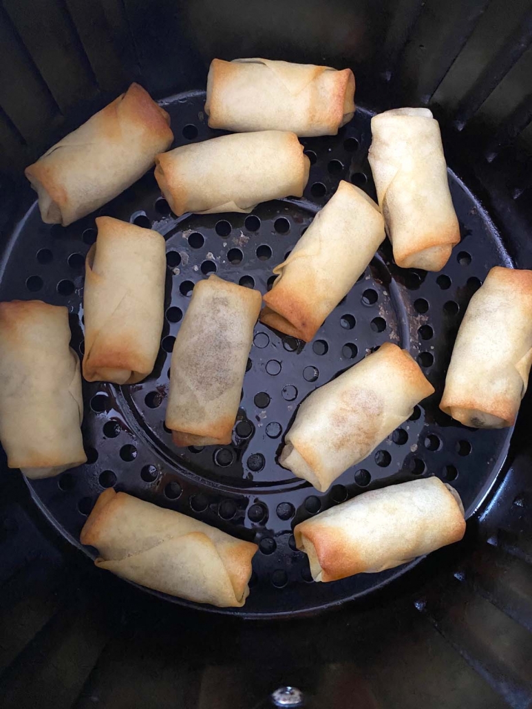 close up of spring rolls in air fryer