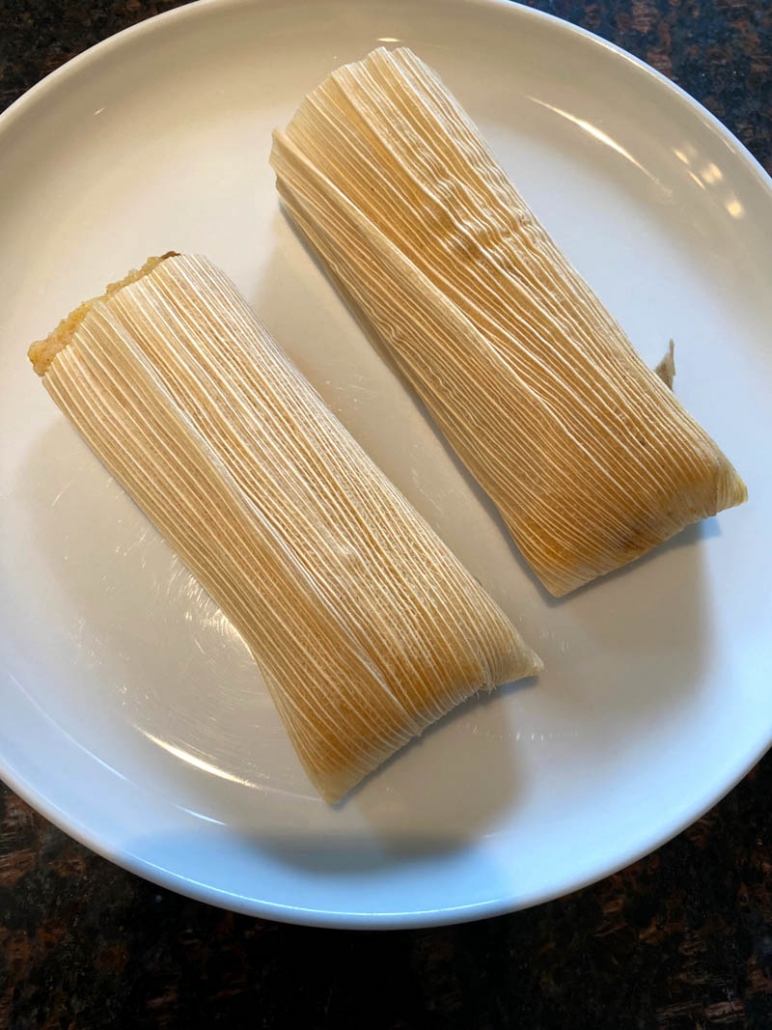 two tamales on a plate
