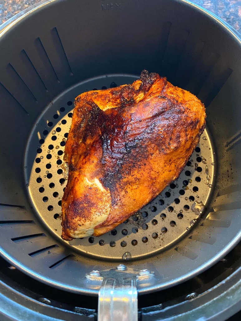 air fried bone-in chicken breast in the air fryer basket