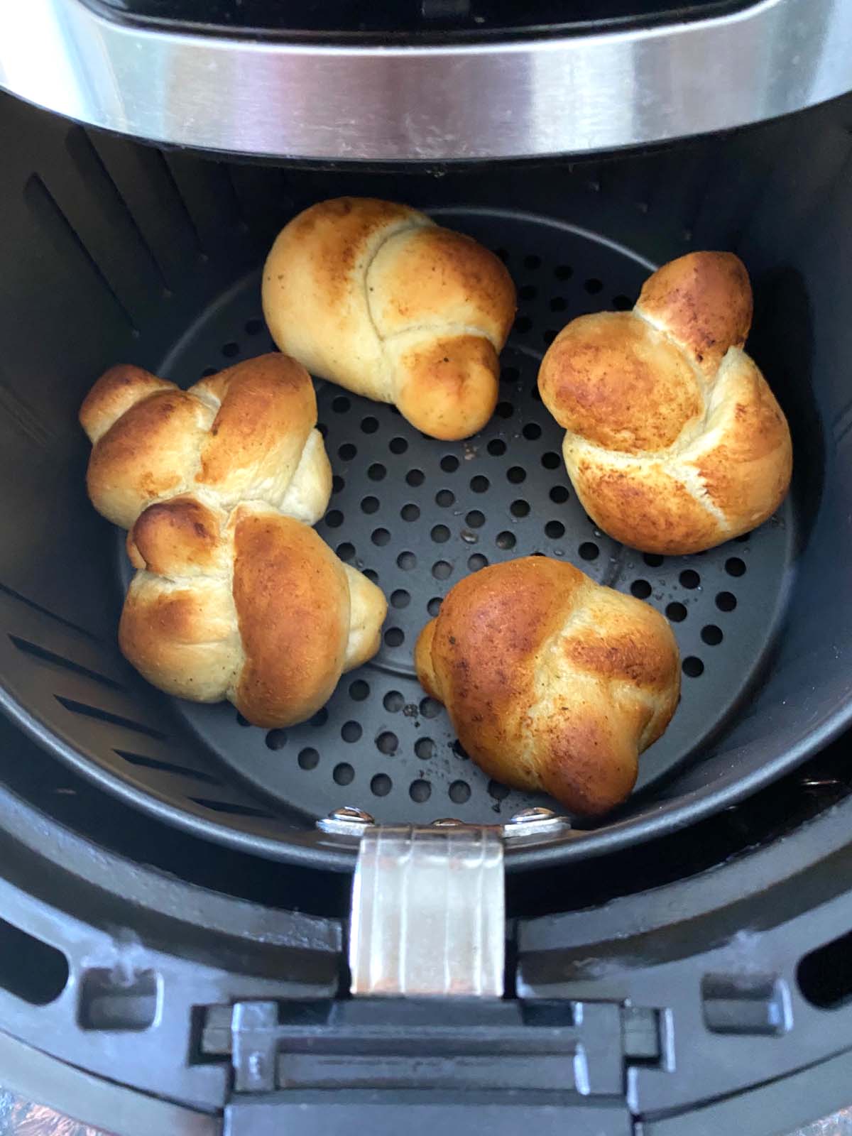 Baked garlic knots in an air fryer. 