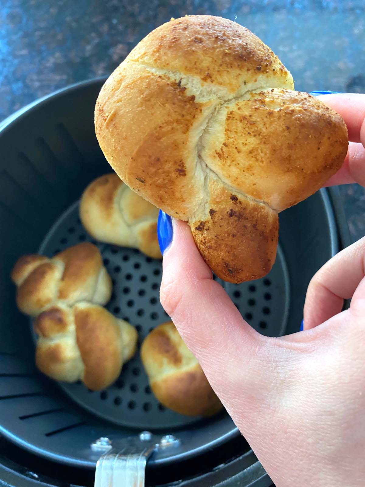 Baked garlic knots in an air fryer. 