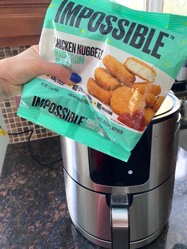 package of Impossible Chicken Nuggets In front of Air Fryer