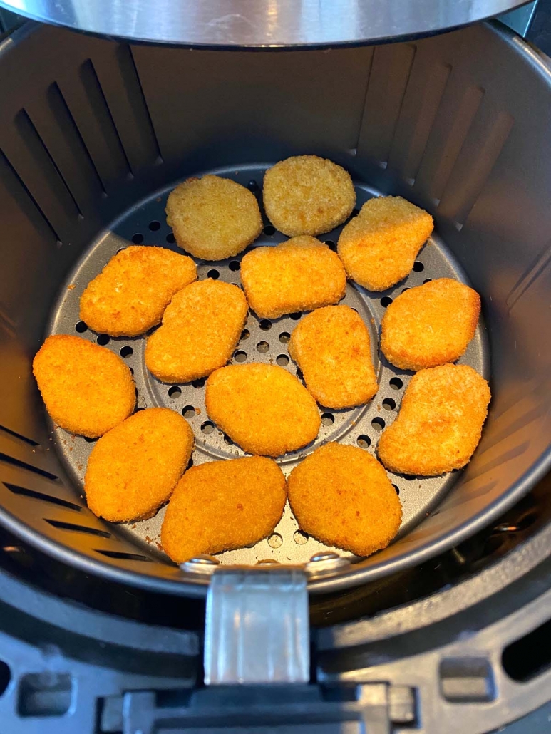 cooked Impossible chicken nuggets in air fryer basket