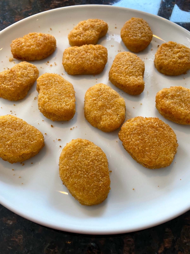 crispy, golden brown Air Fryer Impossible Chicken Nuggets on a plate