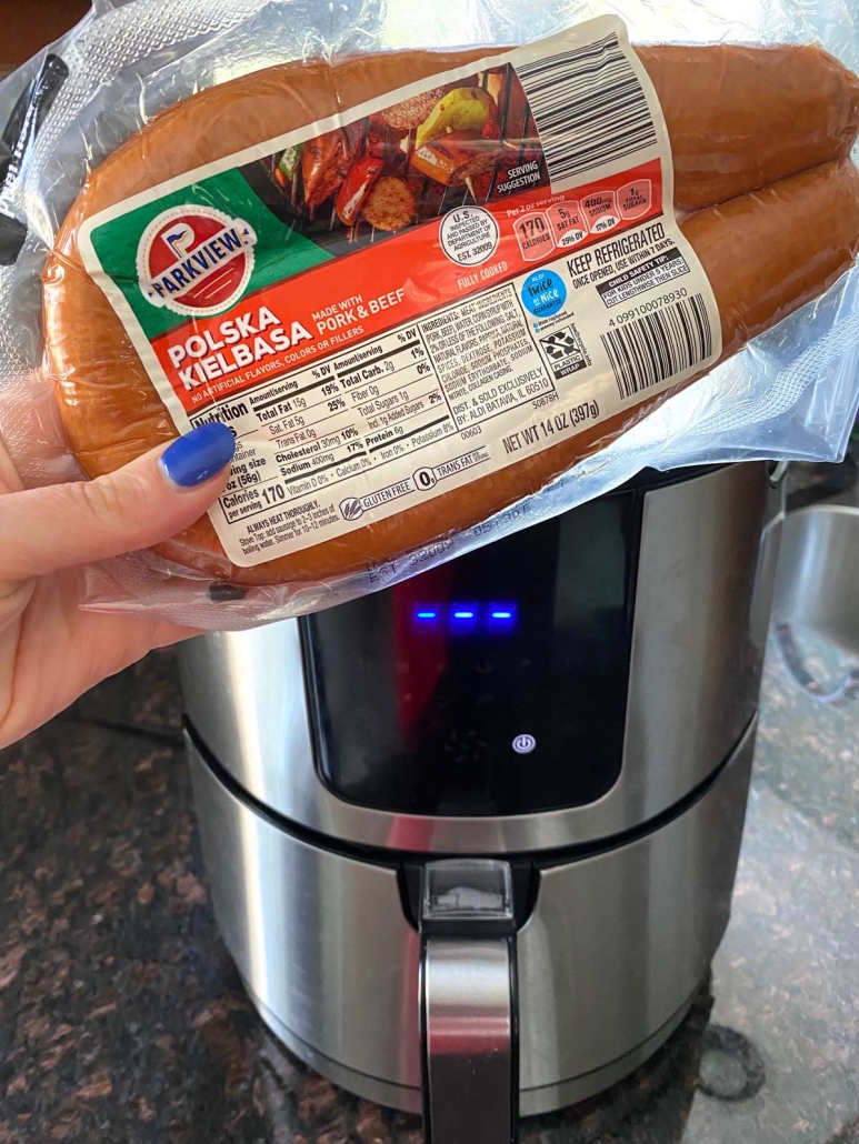 package of kielbasa in front of air fryer