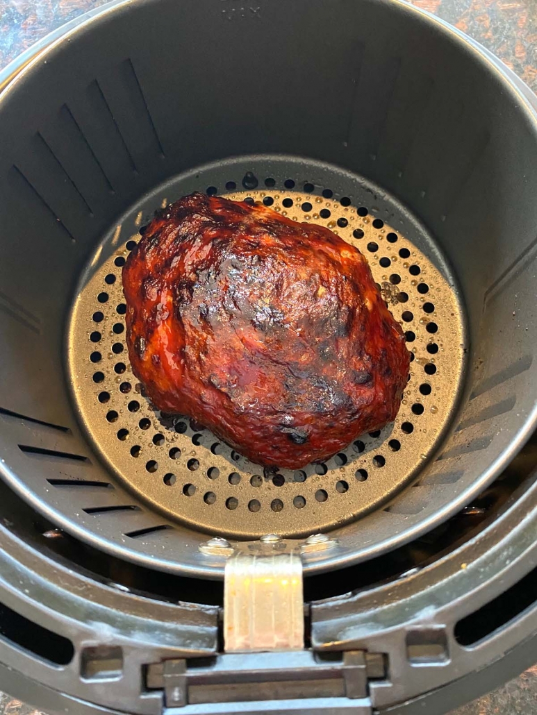 overhead shot of meatloaf being cooked in the air fryer