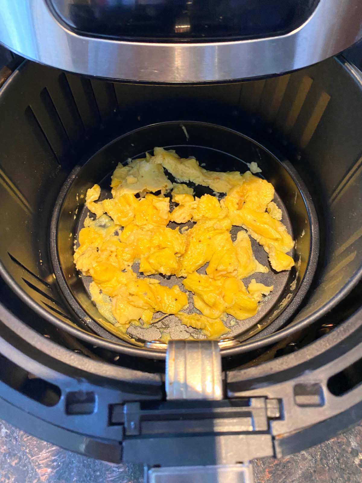 Cooked scrambled eggs in the air fryer.