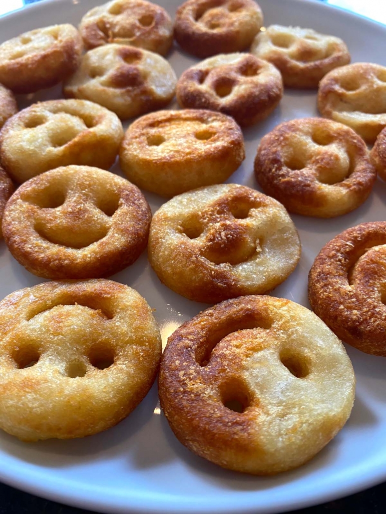 close up of air fried smiley fries
