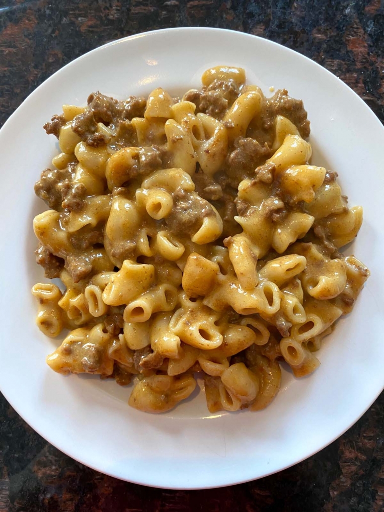 white plate filled with instant pot cooked hamburger helper