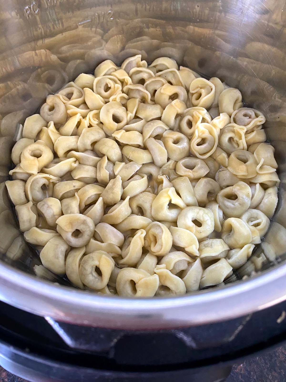 Plain cooked tortellini in an instant pot.