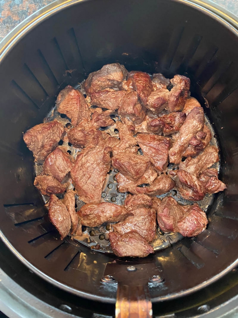 overhead view of steak bites cooked in the air fryer