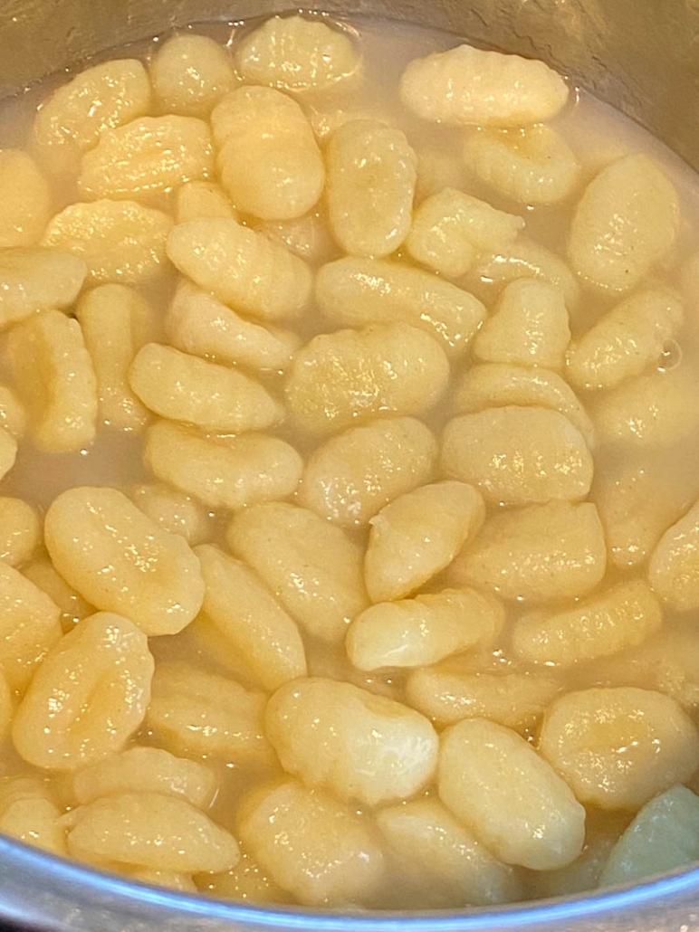 close up of gnocci cooking in instant pot
