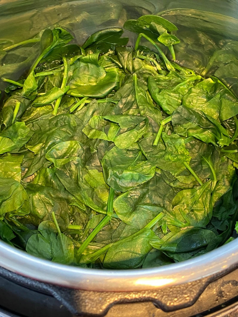 close up of spinach cooked in the instant pot