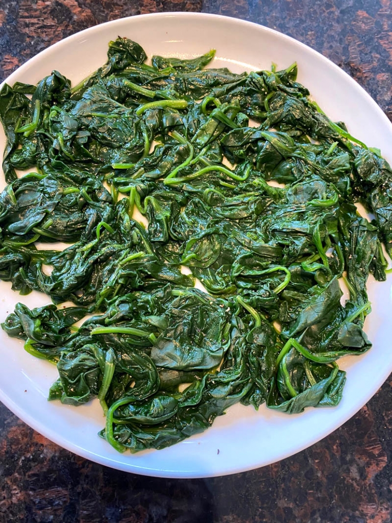 cooked spinach on a plate