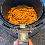 Cooked french fries in an air fryer.