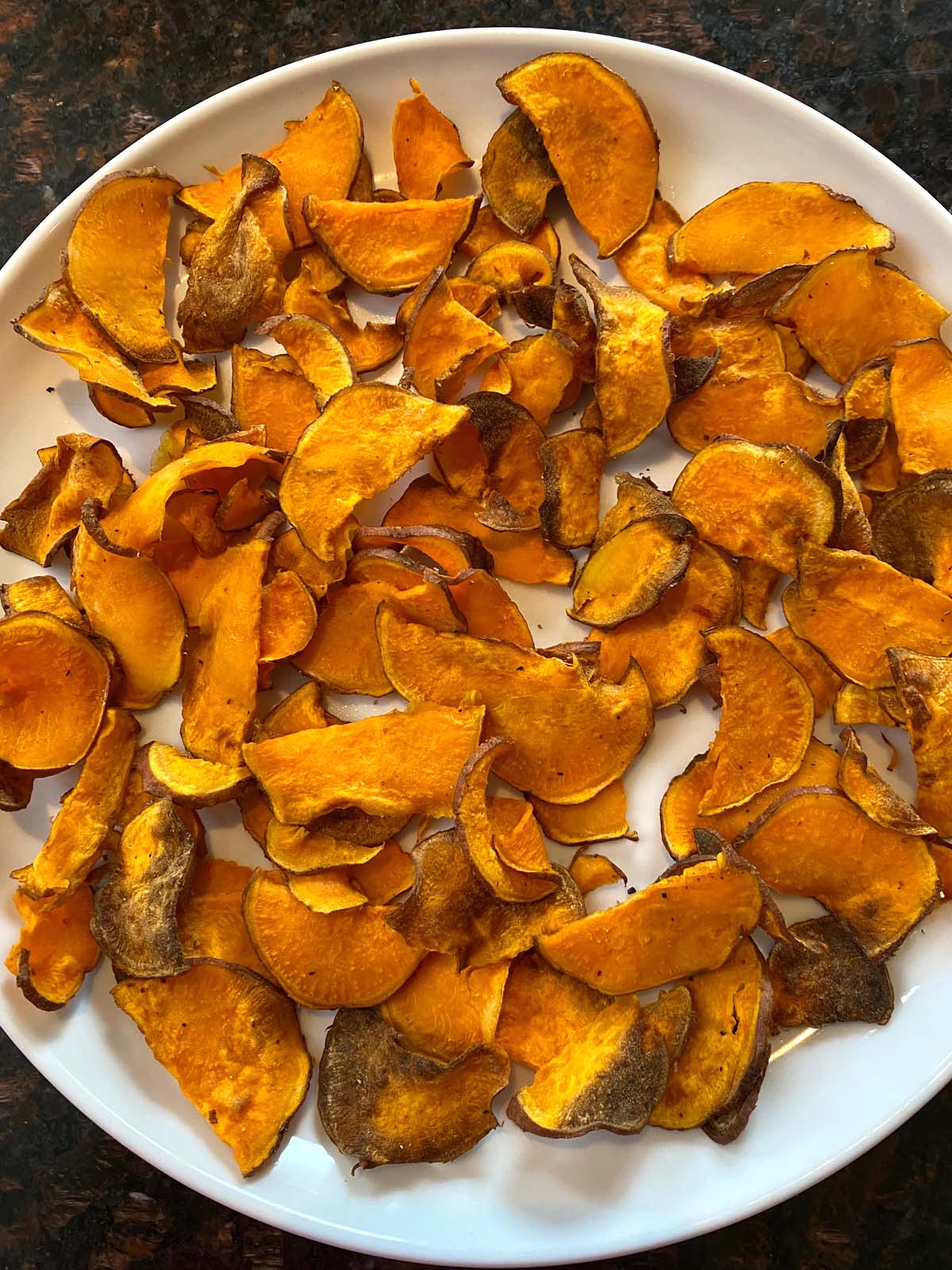 Plate of air fried sweet potato chips.