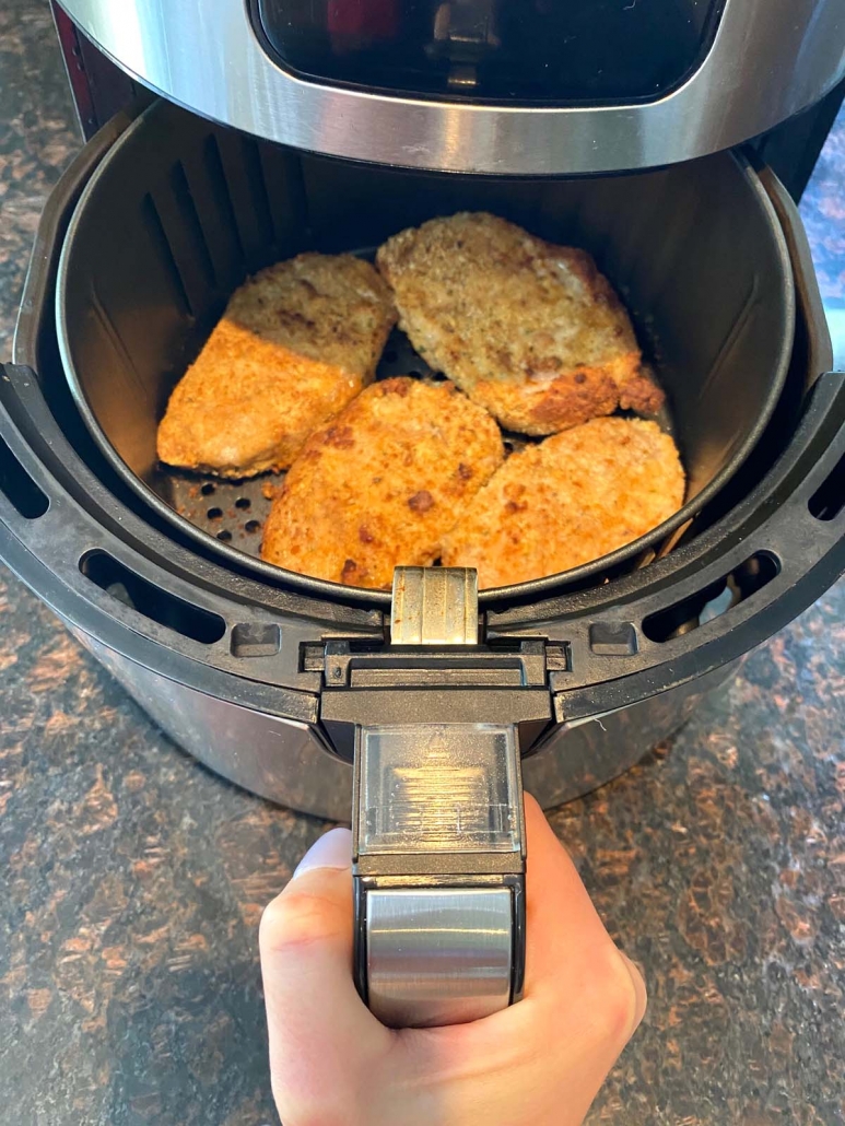 cooked pork chops in air fryer basket