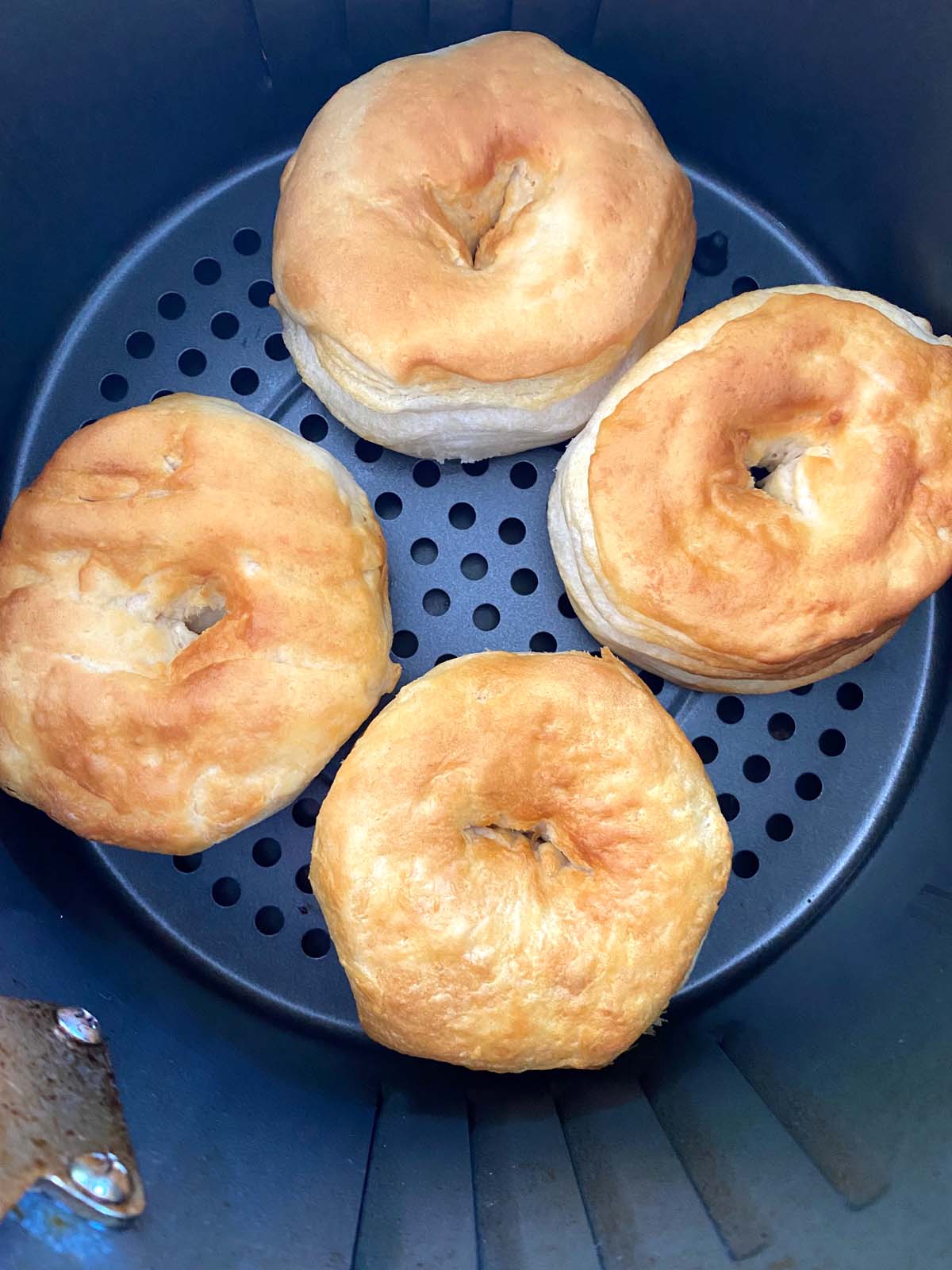 Biscuit donuts in an air fryer.