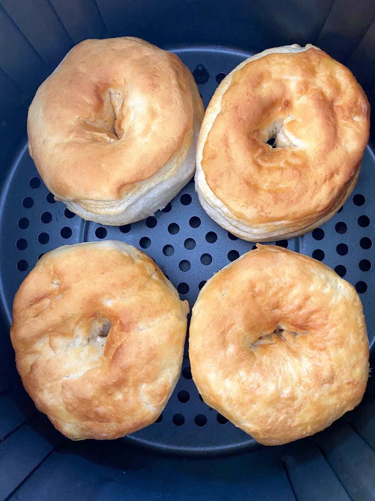 Biscuit donuts in an air fryer.