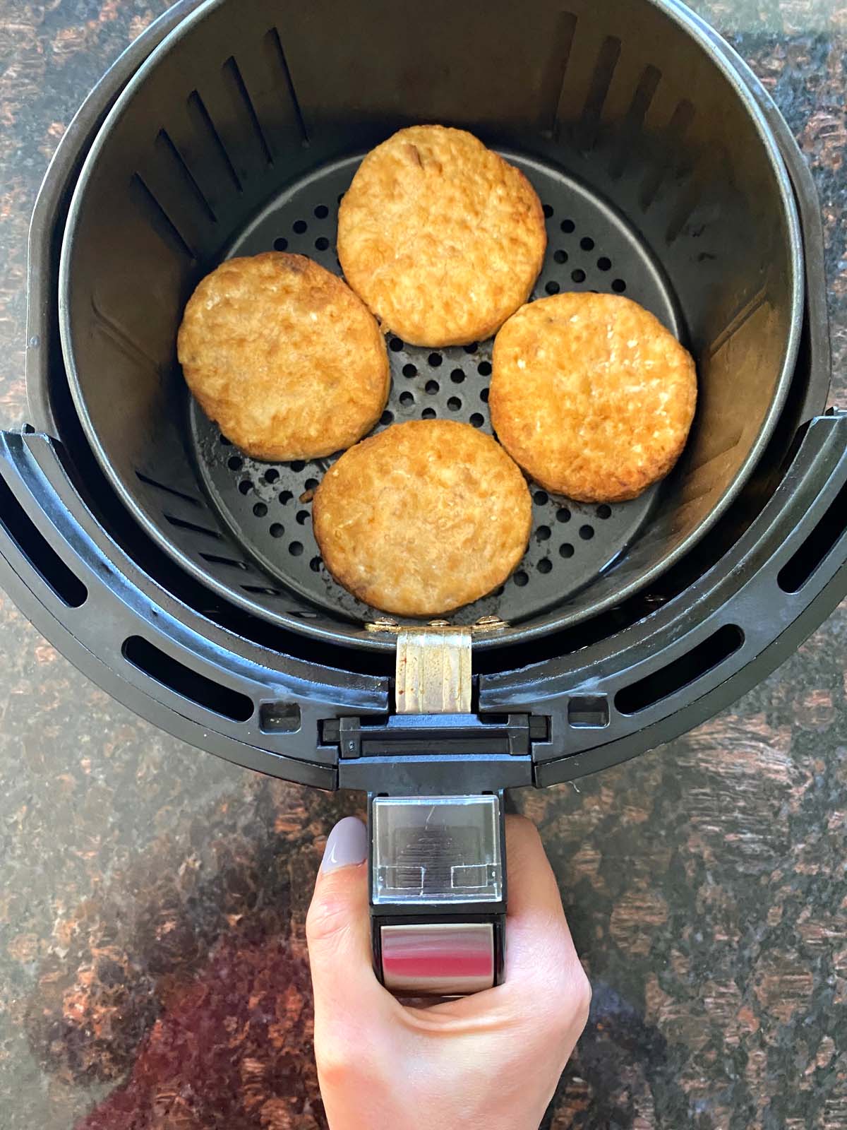 Cooked salmon burgers in the air fryer.