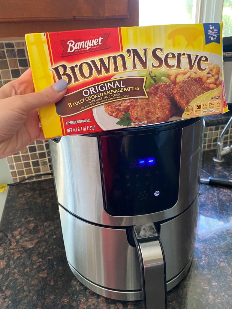 package of frozen breakfast sausage patties in front of air fryer