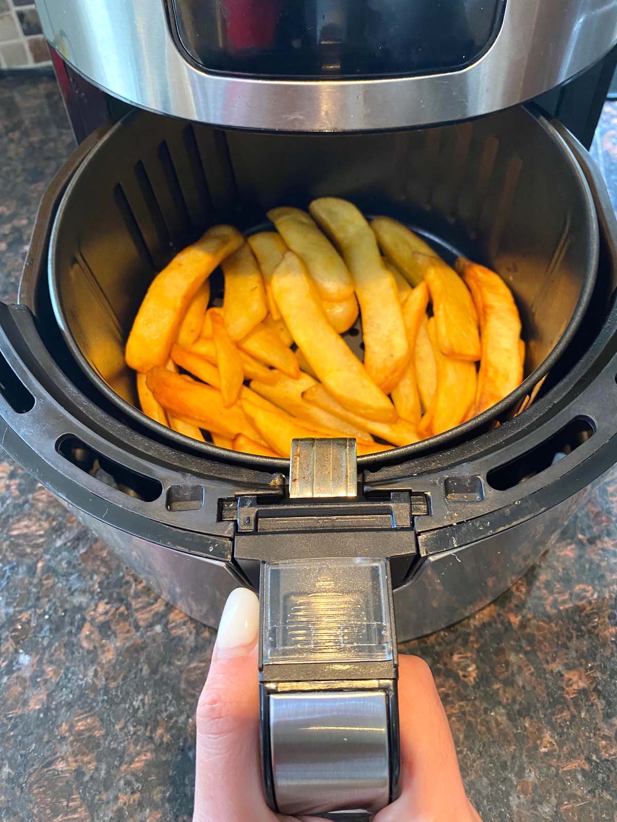 Cooked steak fries in an air fryer. 