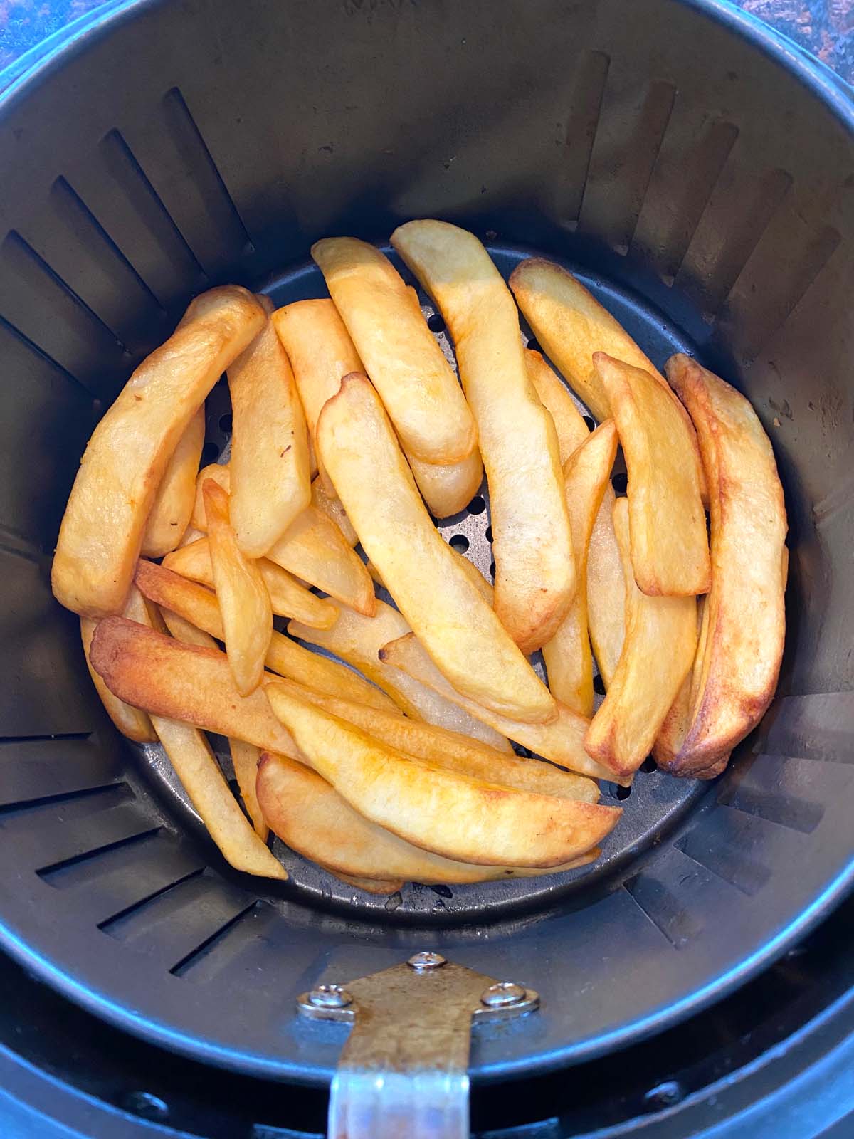 Cooked steak fries in an air fryer. 
