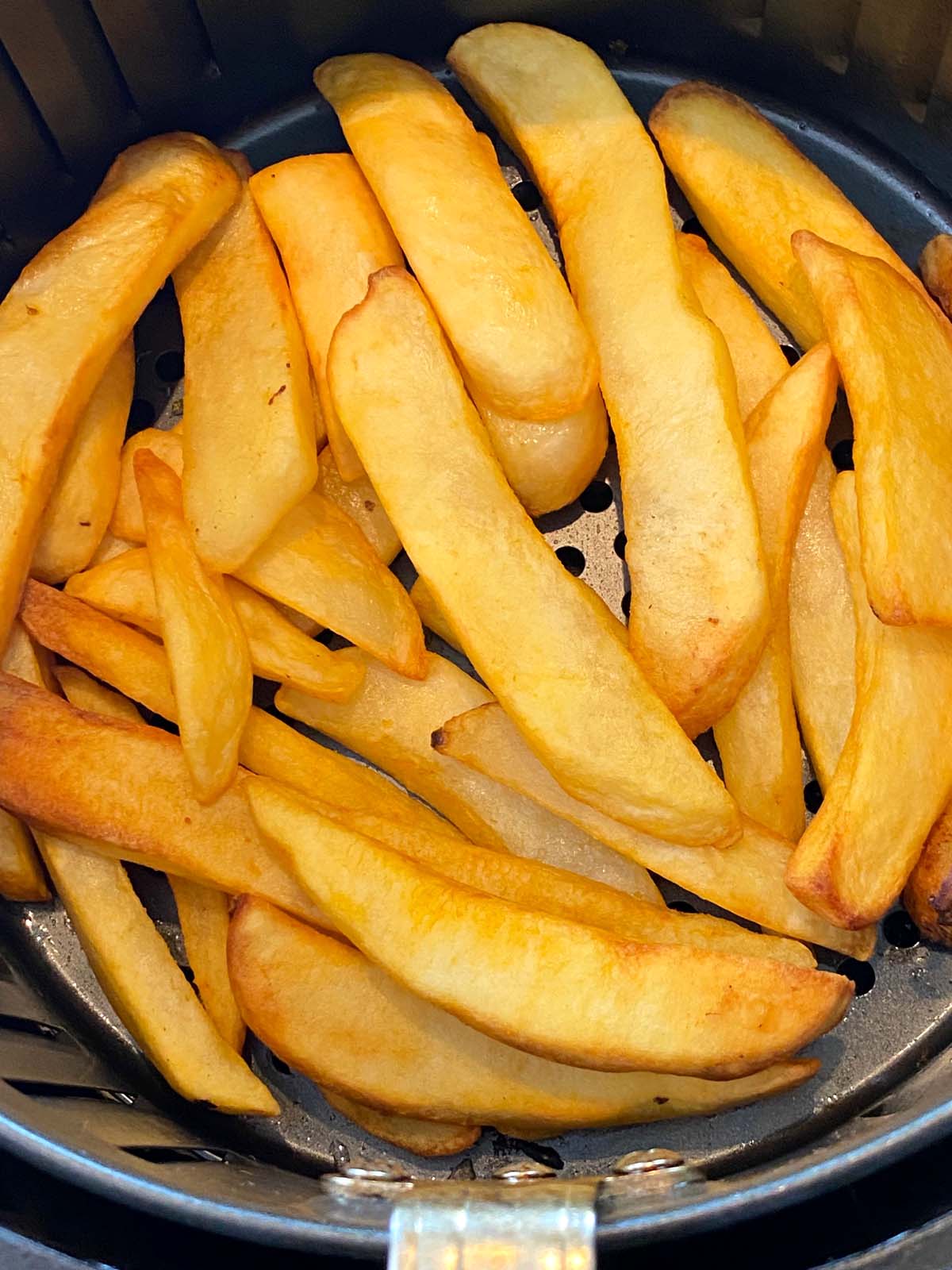 Cooked steak fries in an air fryer. 