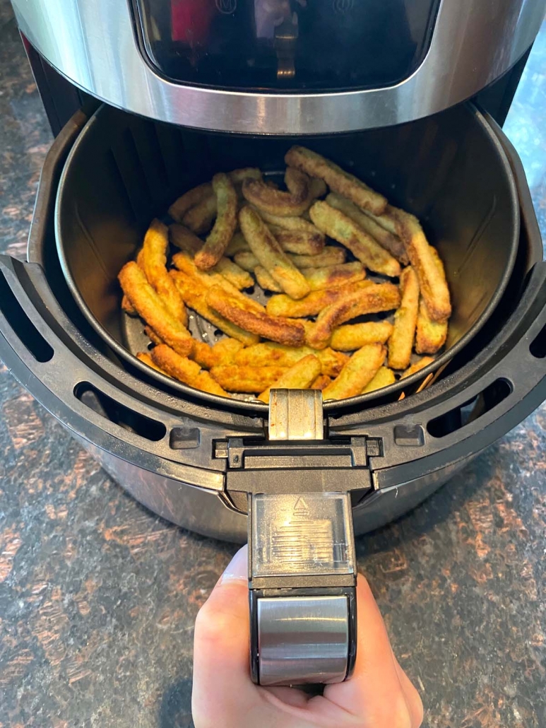 frozen zucchini fries in the air fryer basket