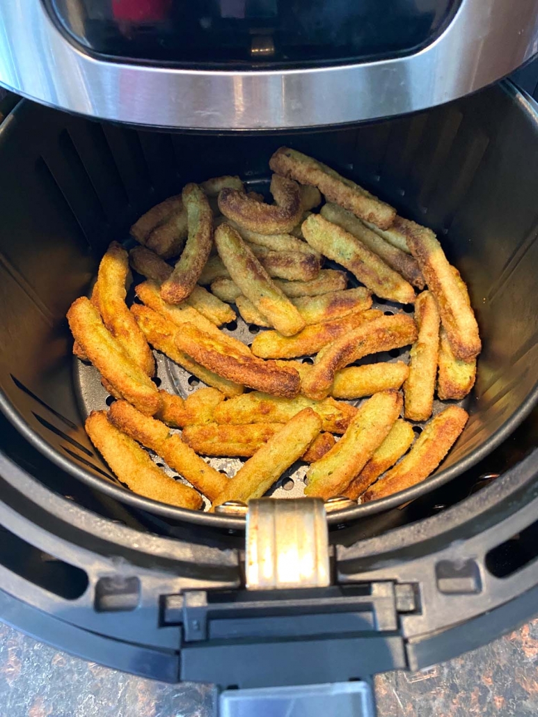 air fried zucchini fries in the air fryer basket