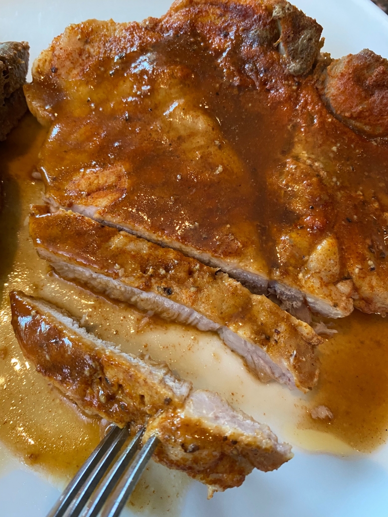 sliced bone in pork chops with gravy