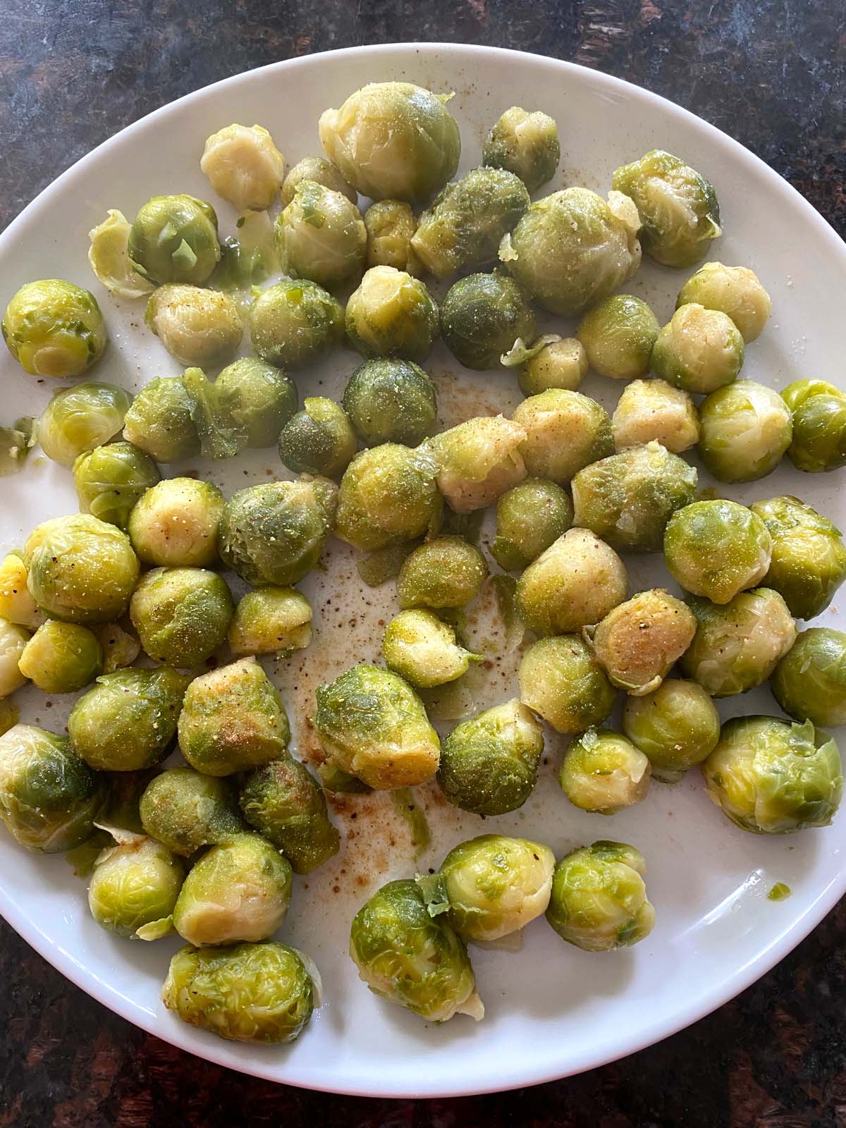 Cooked brussels sprouts on a plate.