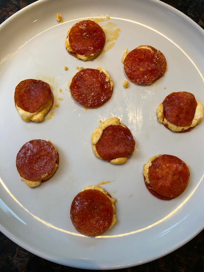air fryer pepperoni cheese bites on a plate